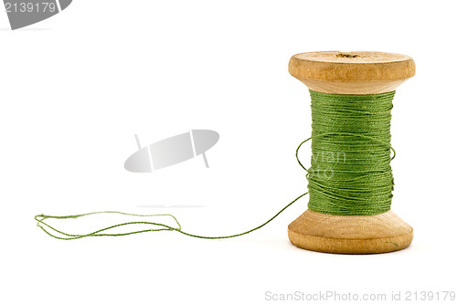 Image of green thread spool