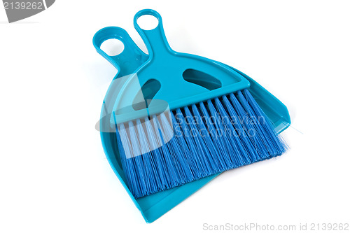 Image of blue shovel and brush