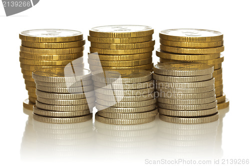 Image of stack of coins with reflection