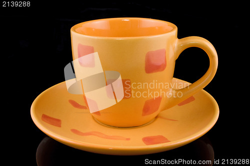 Image of coffee cup over a black background