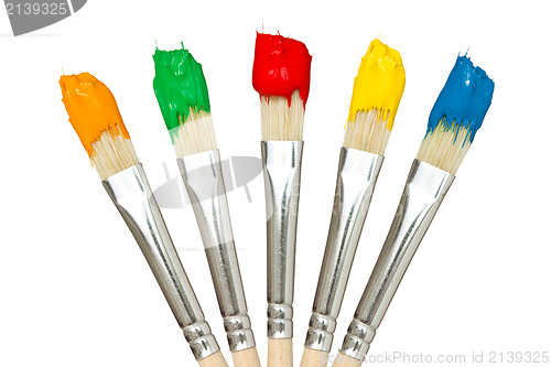 Image of Five paintbrushes with color paints