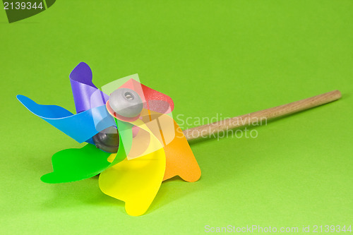 Image of Colorful pinwheel over green