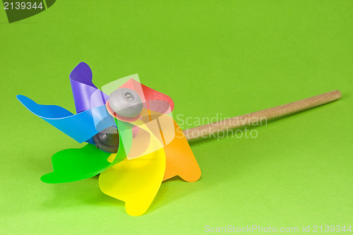 Image of Colorful pinwheel over green