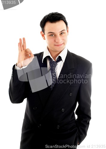 Image of friendly businessman showing ok sign