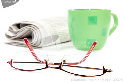 Image of coffee,newspaper and glasses