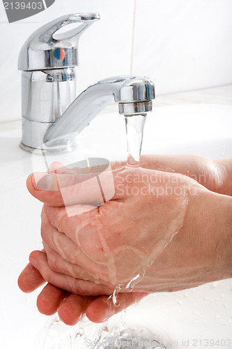 Image of washing hands