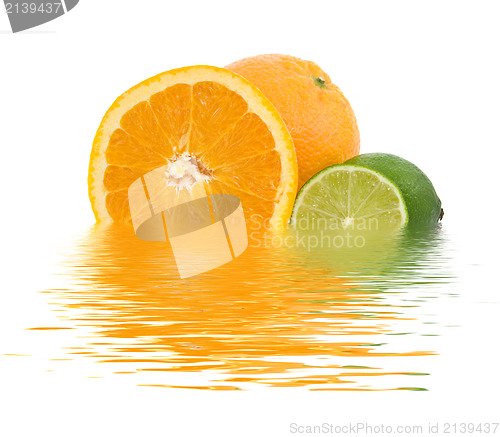 Image of orange fruit and green lemon
