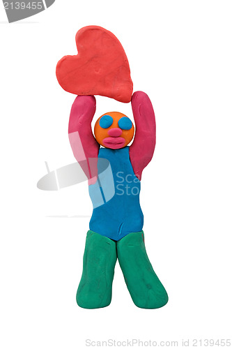 Image of plasticine man hold heart