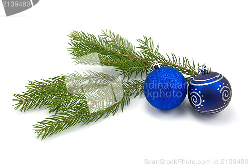 Image of fir branch with christmas baubles