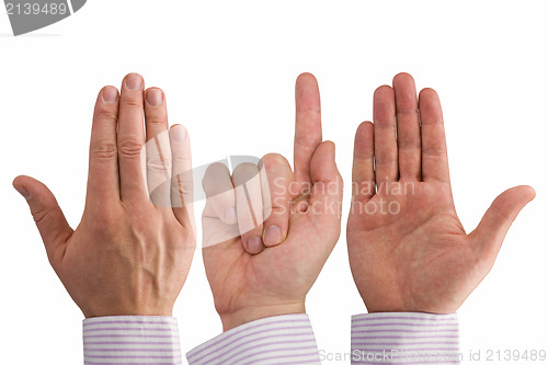 Image of three hands expressing different symbols