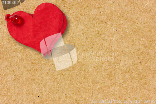Image of Paper hearts pinned to the  cardboard