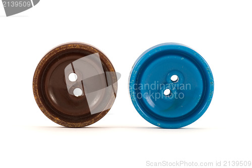 Image of brown and blue clothes buttons