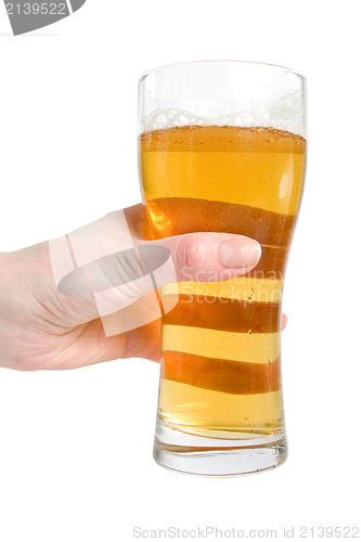 Image of female hand hold glass of lager beer