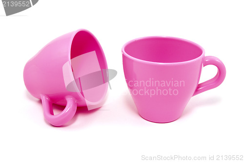 Image of two pink plastic cups