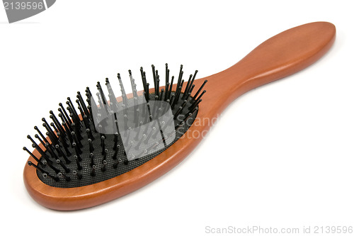 Image of hairbrush with wooden handle