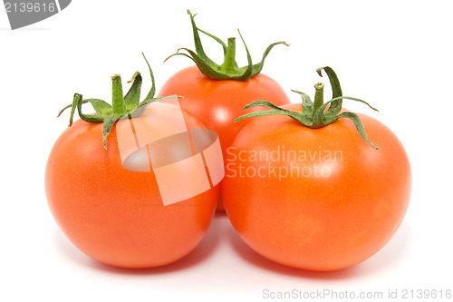 Image of three red tomatoes