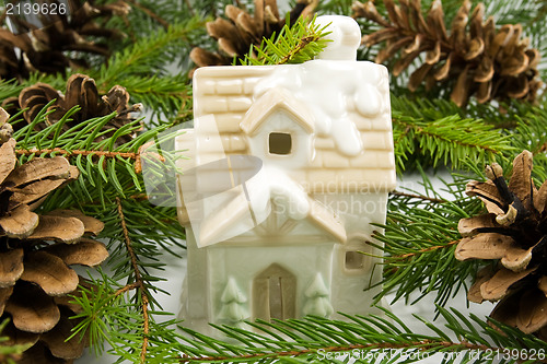 Image of house,cones and fir branches