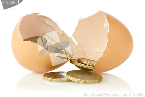 Image of Broken  eggs with coins 