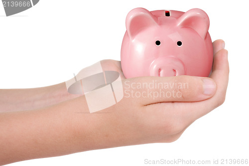 Image of hands with piggy bank