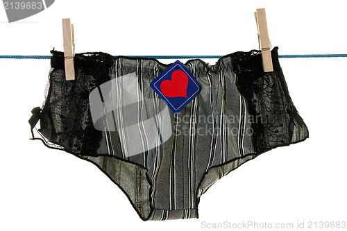 Image of Woman's panties with red heart symbol