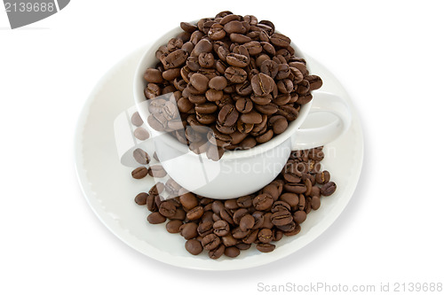 Image of white cup with coffee beans 