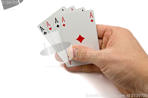 Image of hand with four aces