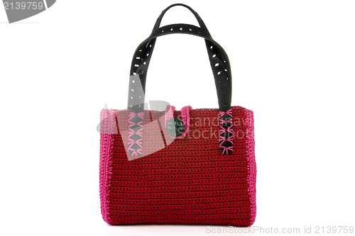 Image of red knitted handbag