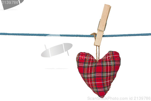 Image of handmade heart hang on the rope