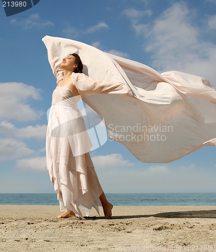 Image of Beautiful woman on the beach