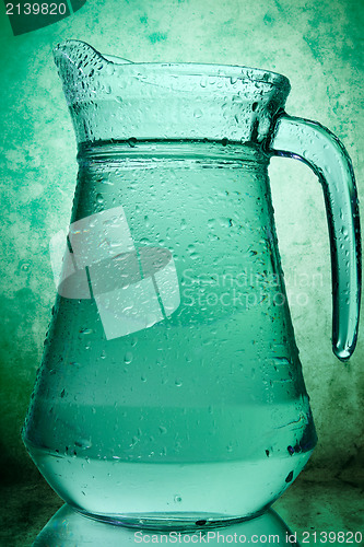 Image of water in a glass pitcher 