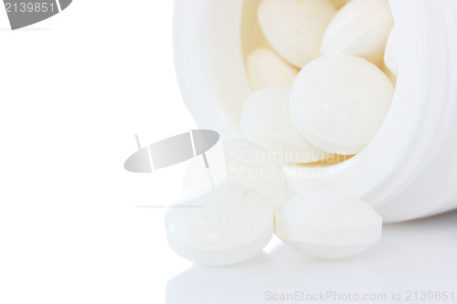 Image of  tablets over a white background