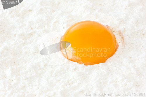 Image of flour with egg yolk