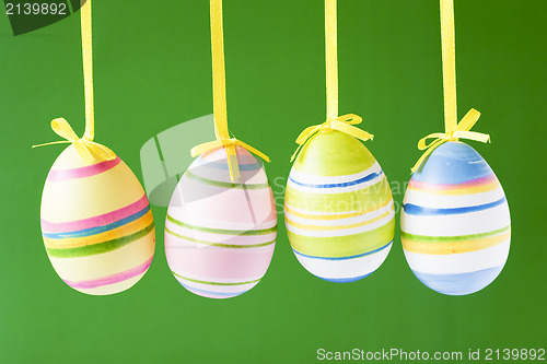 Image of four hung easter eggs