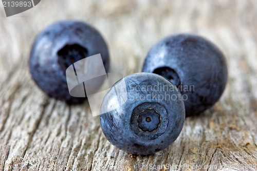 Image of blueberries  on wooden background