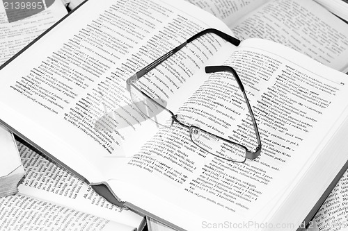 Image of dictionary and glasses