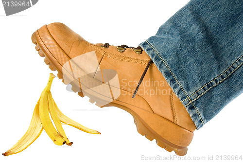 Image of Man stepping on banana peel