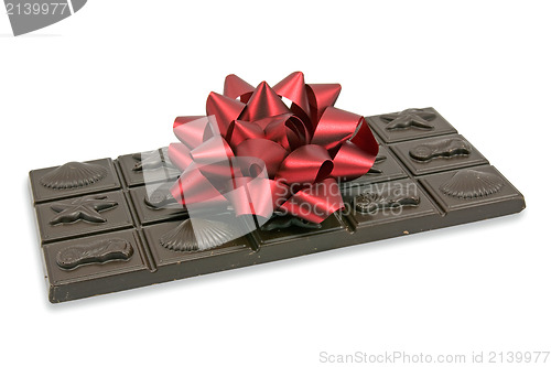 Image of dark chocolate with red bow