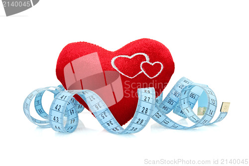 Image of red heart with measure tape