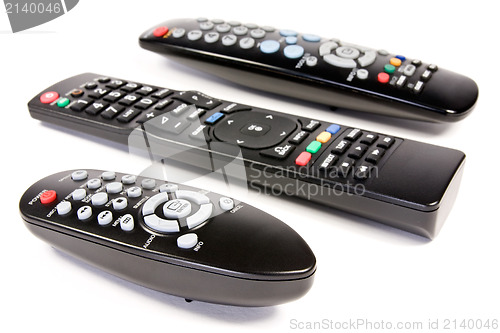 Image of three remote controls 