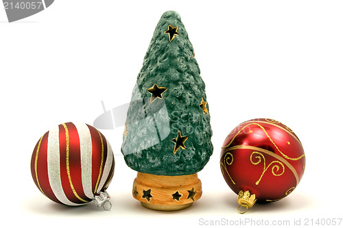 Image of christmas tree and  baubles on white background