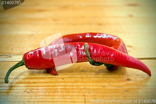 Image of red Chili peppers on the floor
