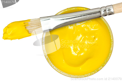 Image of Yellow paint with paintbrush