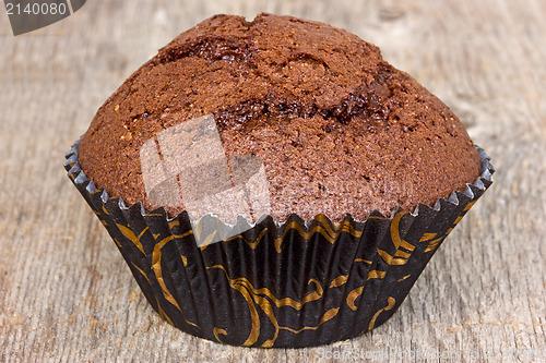 Image of Muffin on the wooden plank