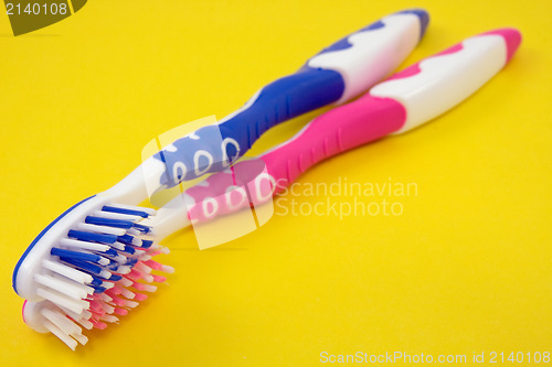 Image of Two colorful tooth-brushes