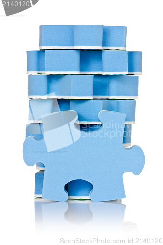 Image of stack of blue puzzle
