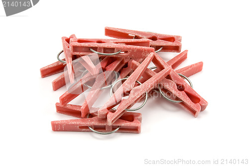 Image of pile of plastic clothes pegs