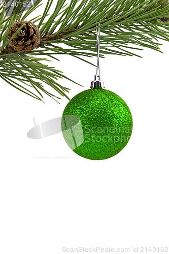 Image of branch with green bauble