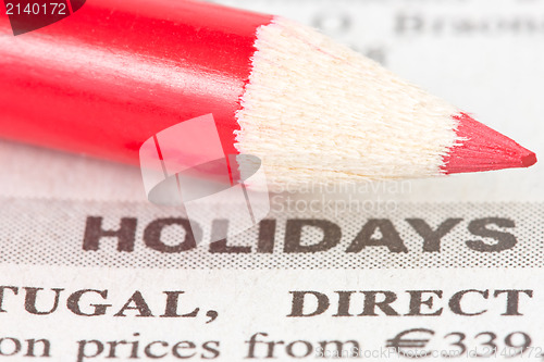 Image of newspaper  with holidays ad