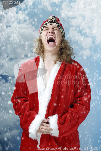 Image of Happy screaming Santa and snowfall