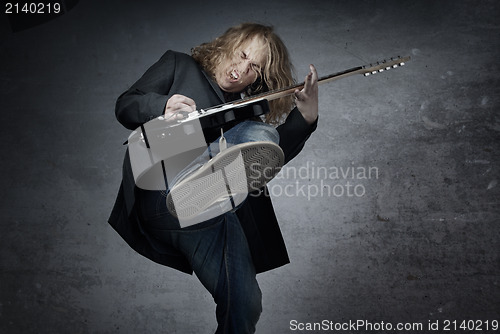 Image of Jumping rock guitarist